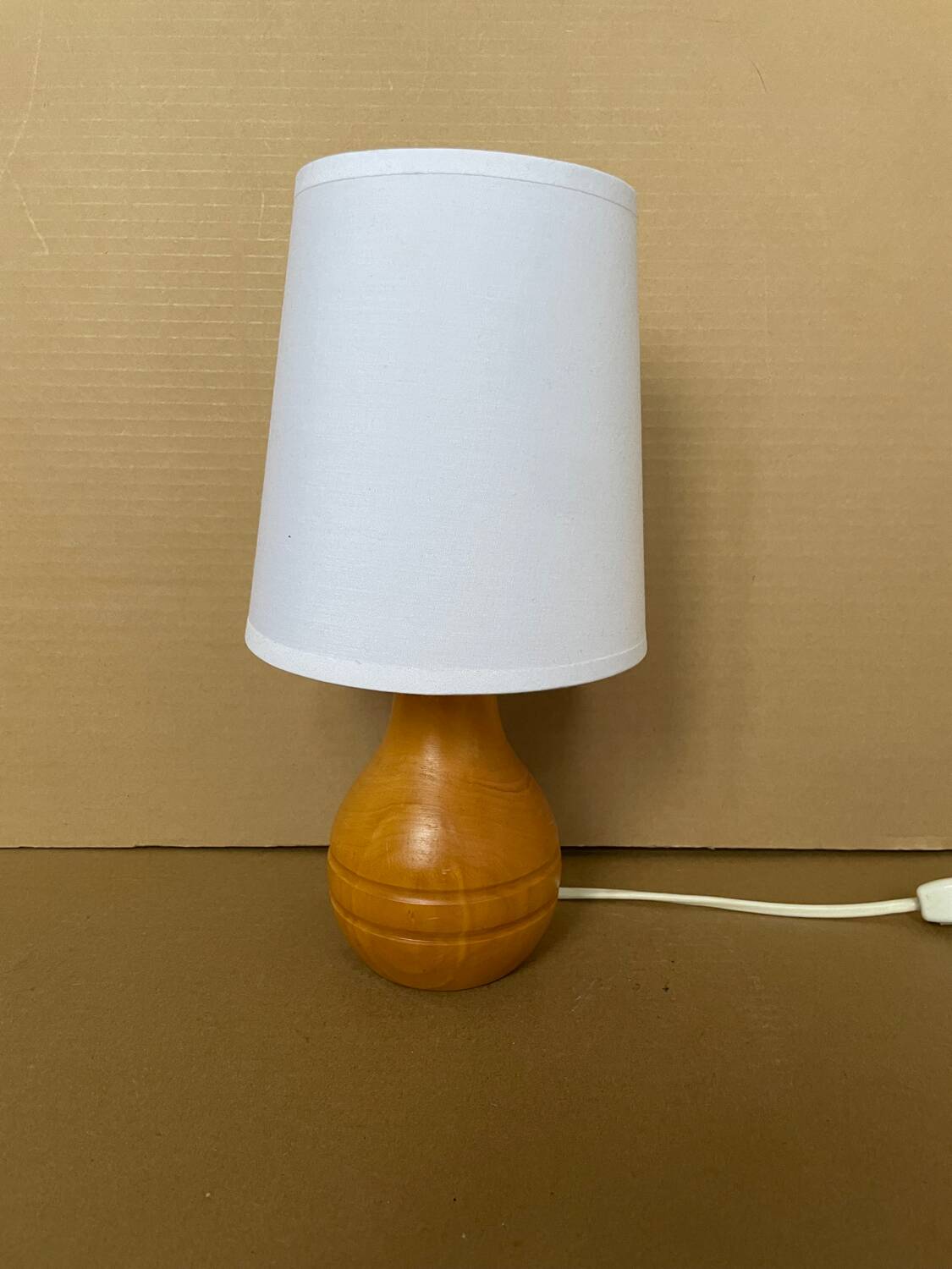 Small old turned wood lamp