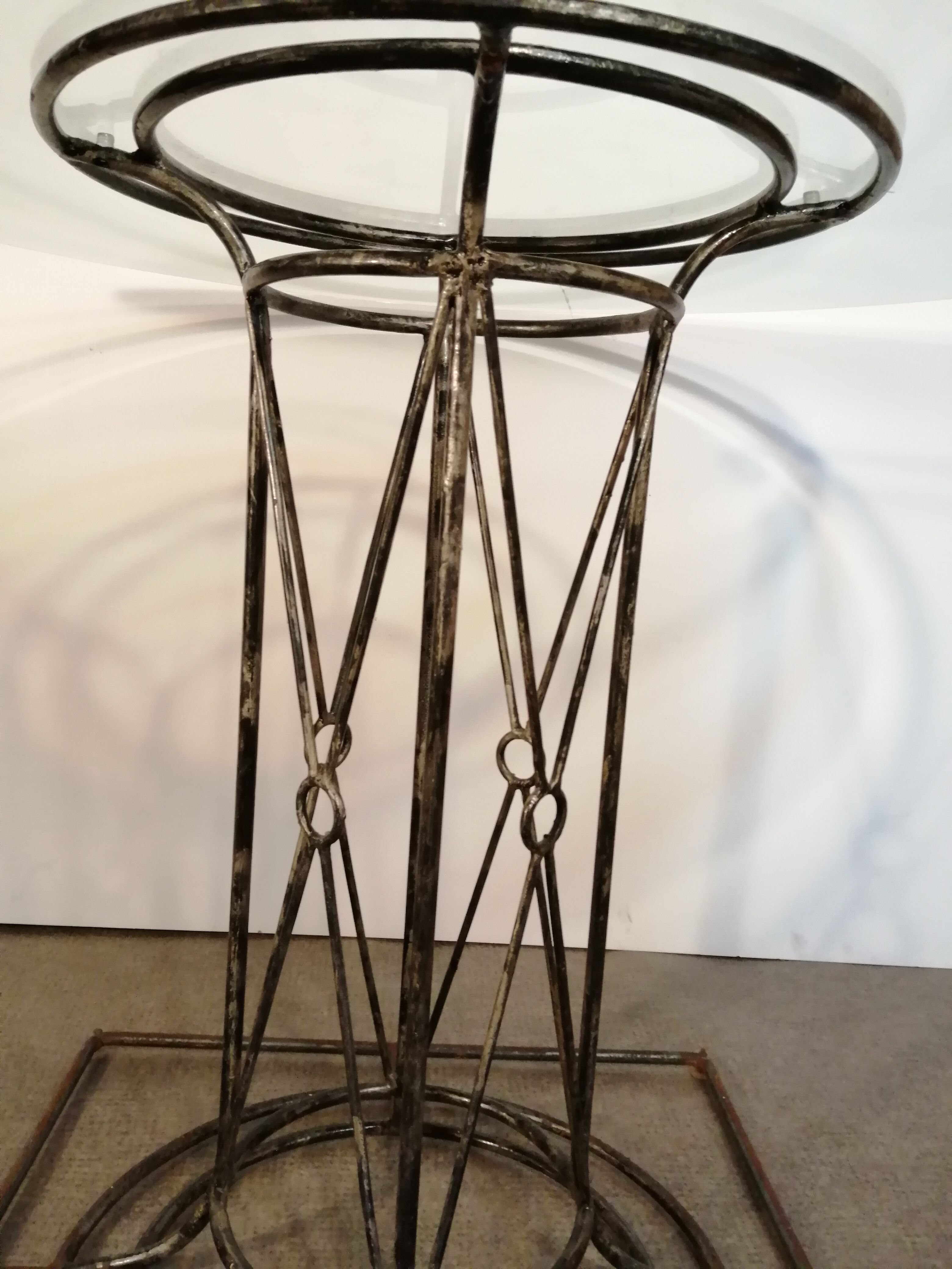 Wrought iron dining table with beveled round glass top, vintage 1980
