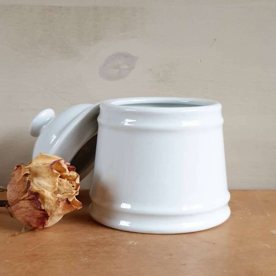 White enameled sugar bowl