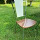White Formica table with extensions and 2 designer chairs