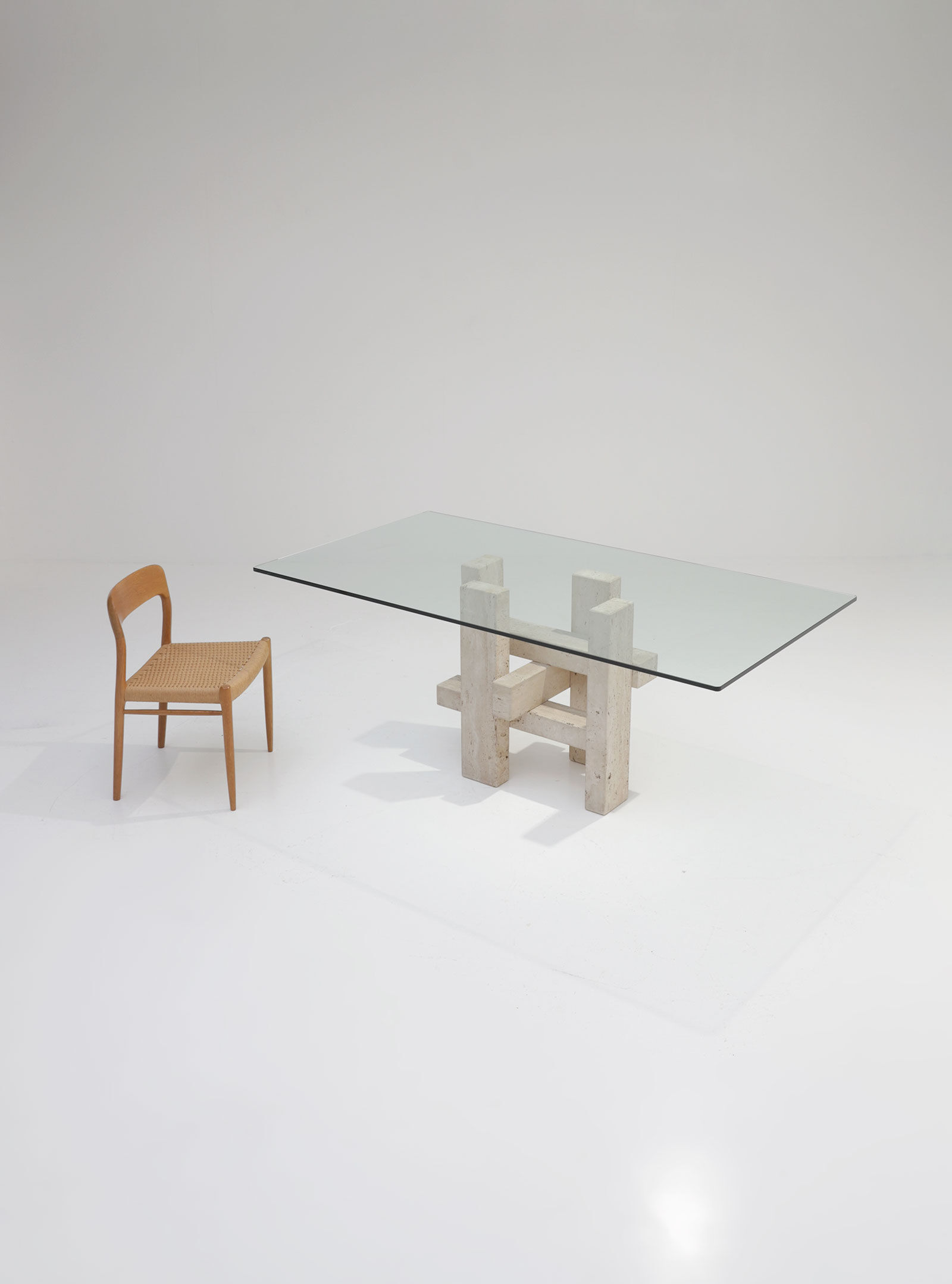 Travertine dining table by Willy Ballez
