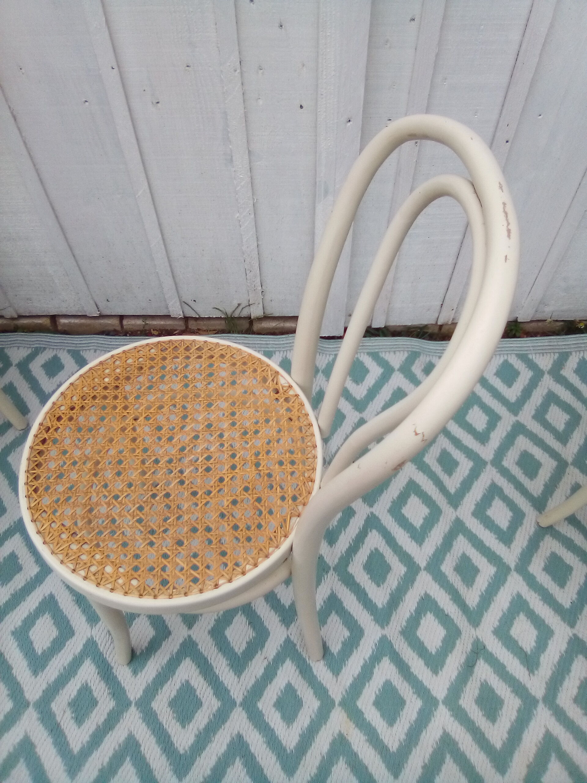 Lot of 4 bistro chairs in caned wood