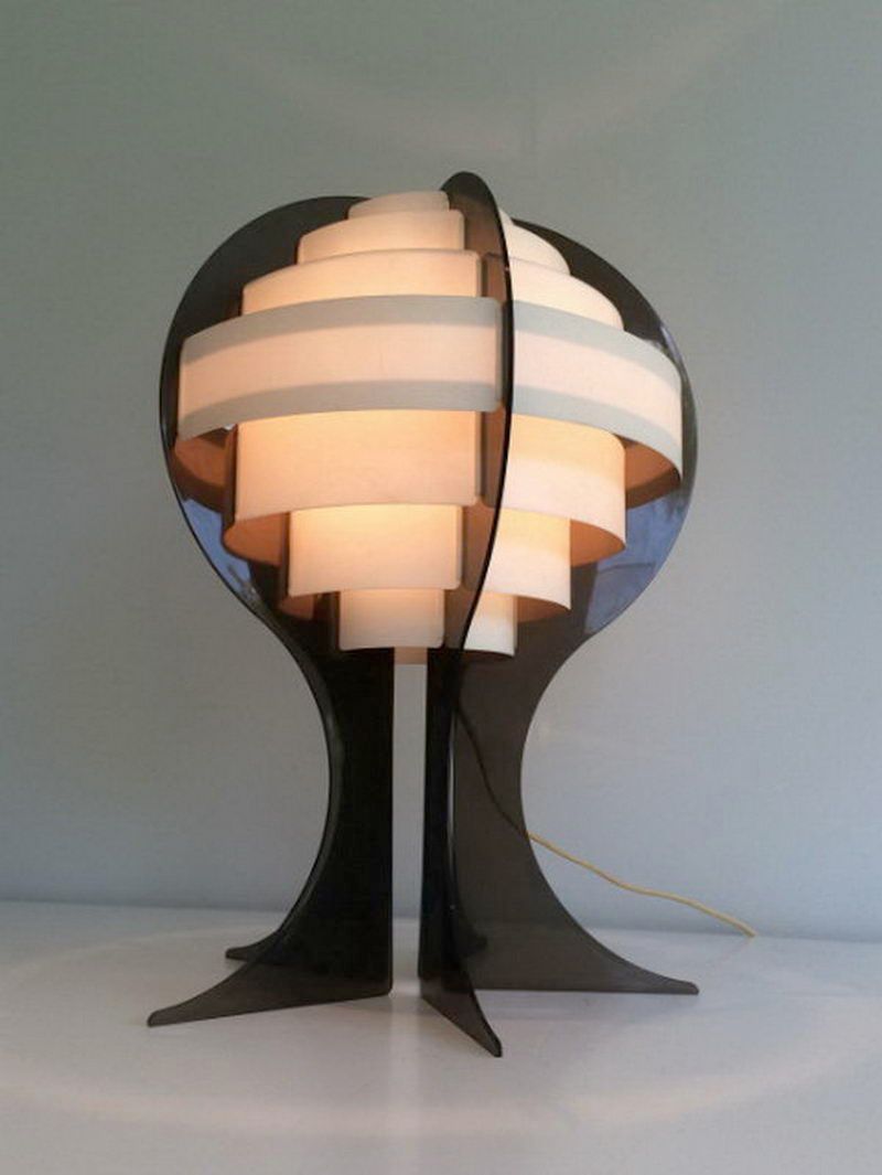 Modernist lamp in plexiglass and white plastic strips.