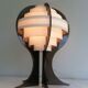 Modernist lamp in plexiglass and white plastic strips.