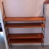 Vintage metal and solid wood string style wall shelf.