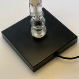 Silver floor lamp with a straight shade.