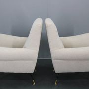 Paire de fauteuils bouclés italiens du milieu du siècle, pieds en fer et laiton, années 1950