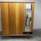 French wardrobe with tapered legs, 3 doors, 1 mirror (27*130), and 1 drawer.