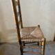 Old turned and stuffed wooden chair