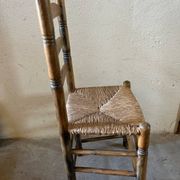 Old turned and stuffed wooden chair