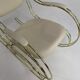 60s rocking chair in brass and ecru faux leather