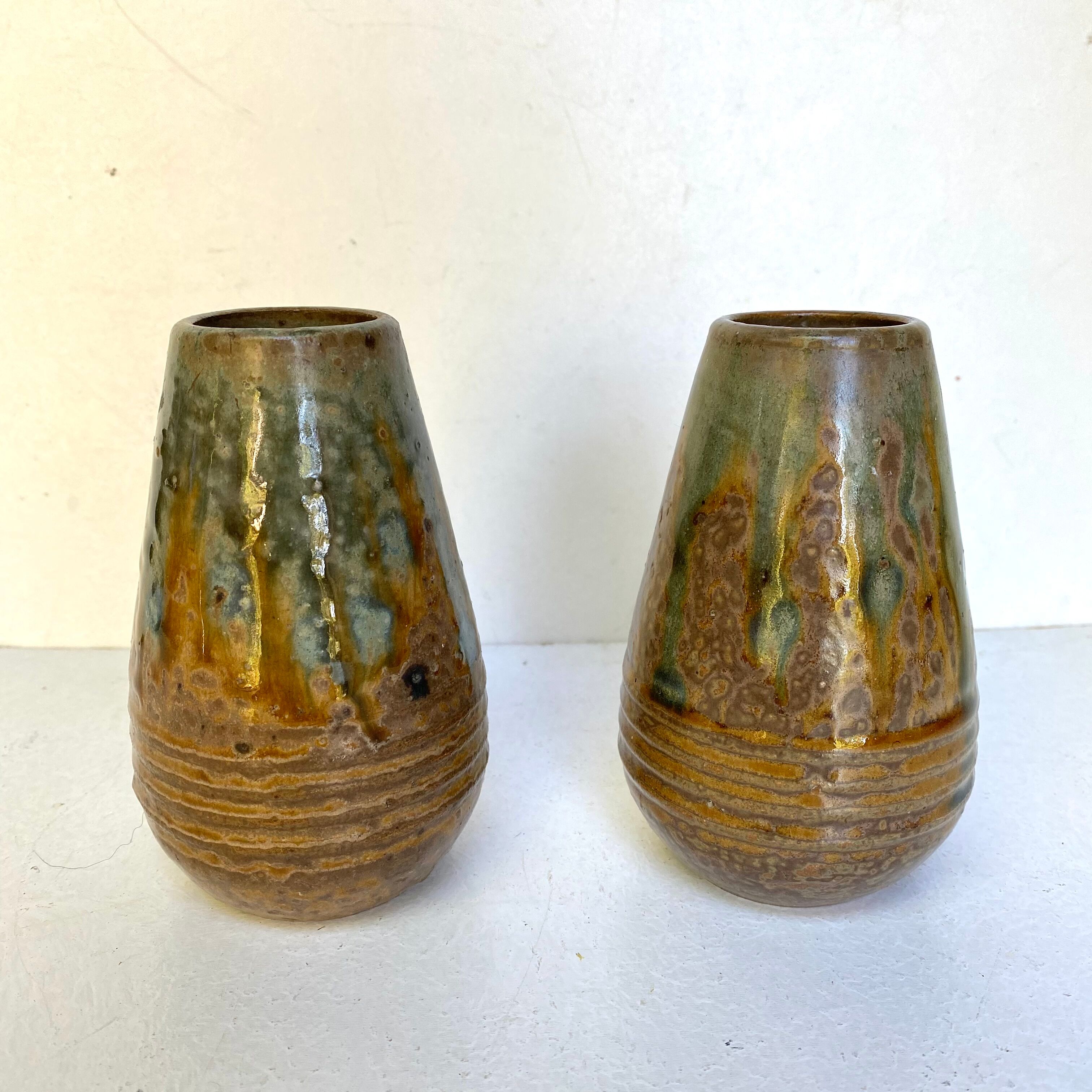 Enamelled stoneware vases