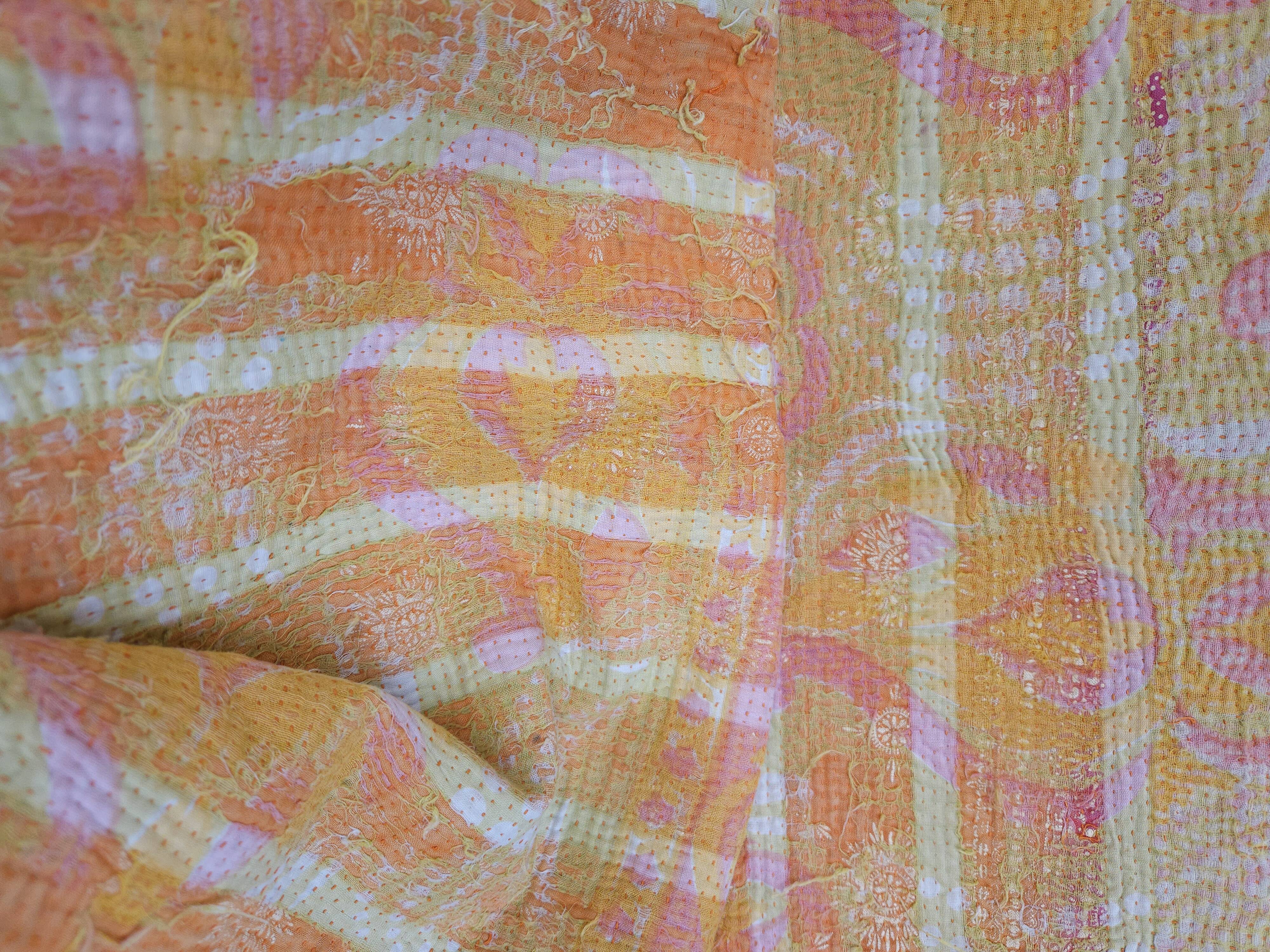 Fabric or plaid. old bed cover recycled and assembled worn deliberately