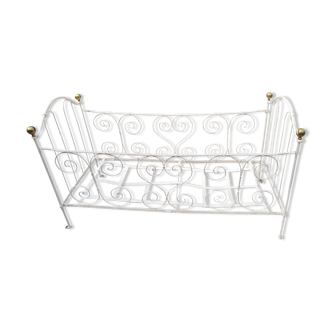 Children's wrought iron bed with copper ball