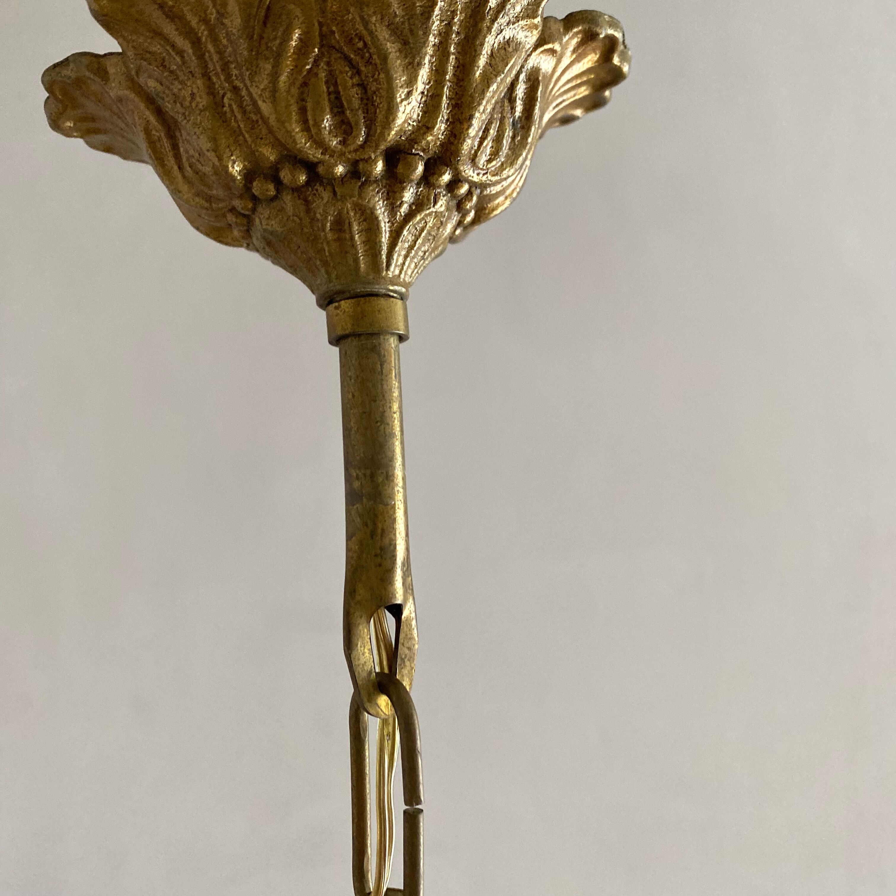 Chandelier with tassels and brass