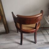 Armchair with canework and bronze detail