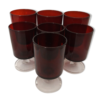 Set of 7 red glasses on foot