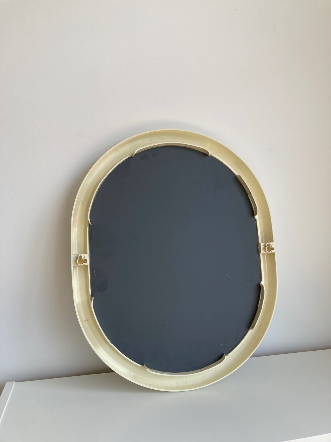 Vintage plastic oval mirror
