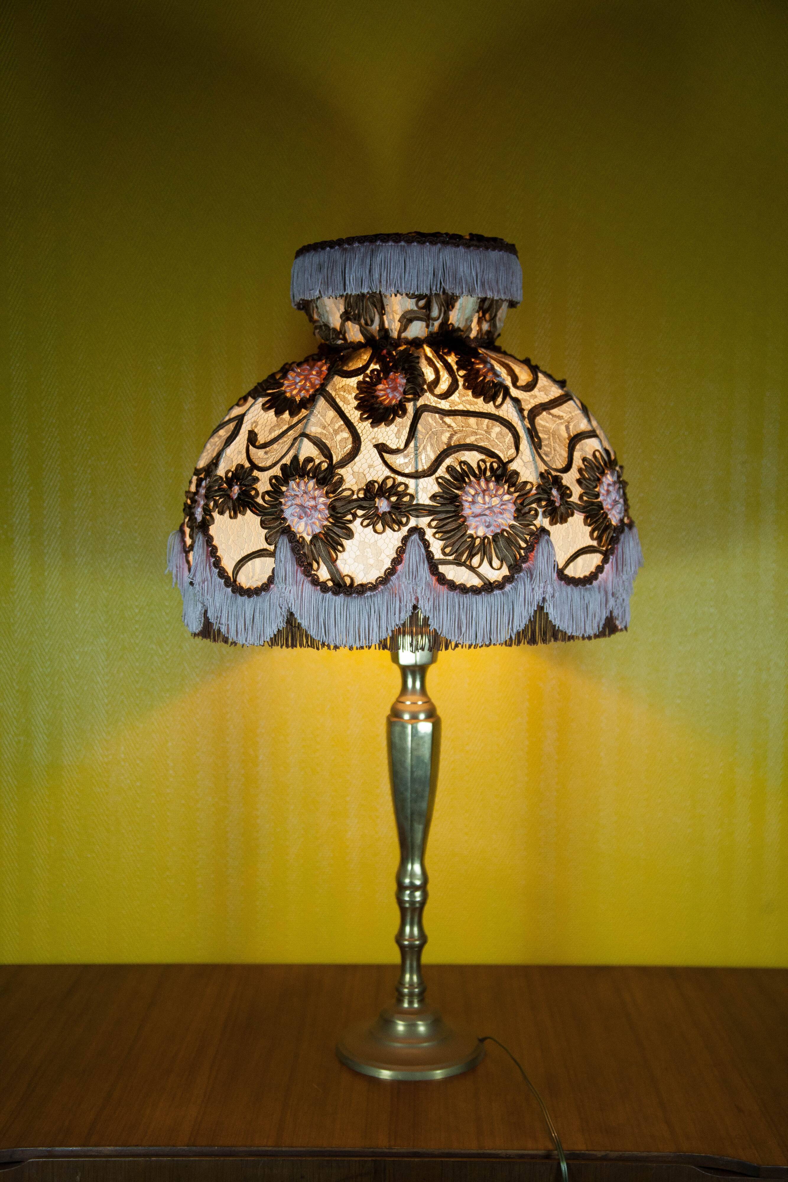 Large brass lamp with lampshade