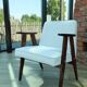 Scandinavian boucle armchair in snow white with dark walnut wood colour, designed by Chierowski, model 366.