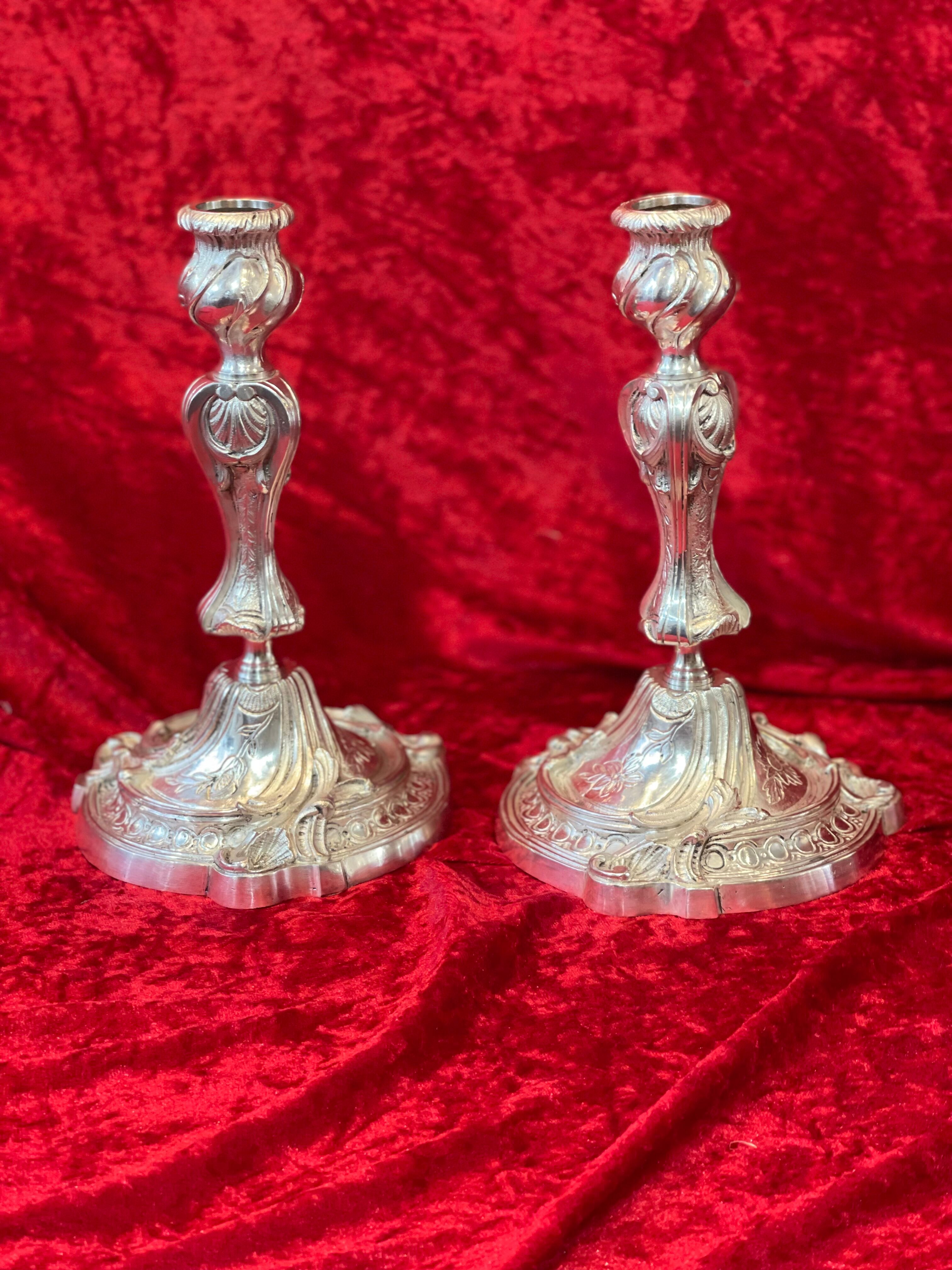 Pair of candlesticks, torches in silver bronze