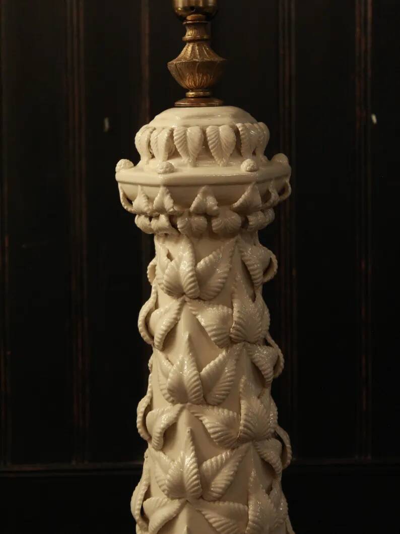 Vintage white ceramic table lamp from Manises with a raised leaf design.