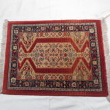 Old rectangular wool carpet, oriental decoration