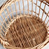 Round openwork wicker storage basket with braided handles