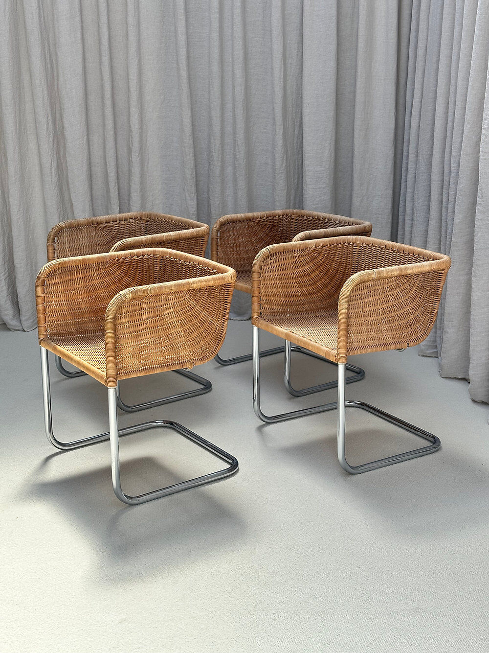 Set of 4 cantilever wicker chairs, attributed to Harvey Probber, USA, 1970s.