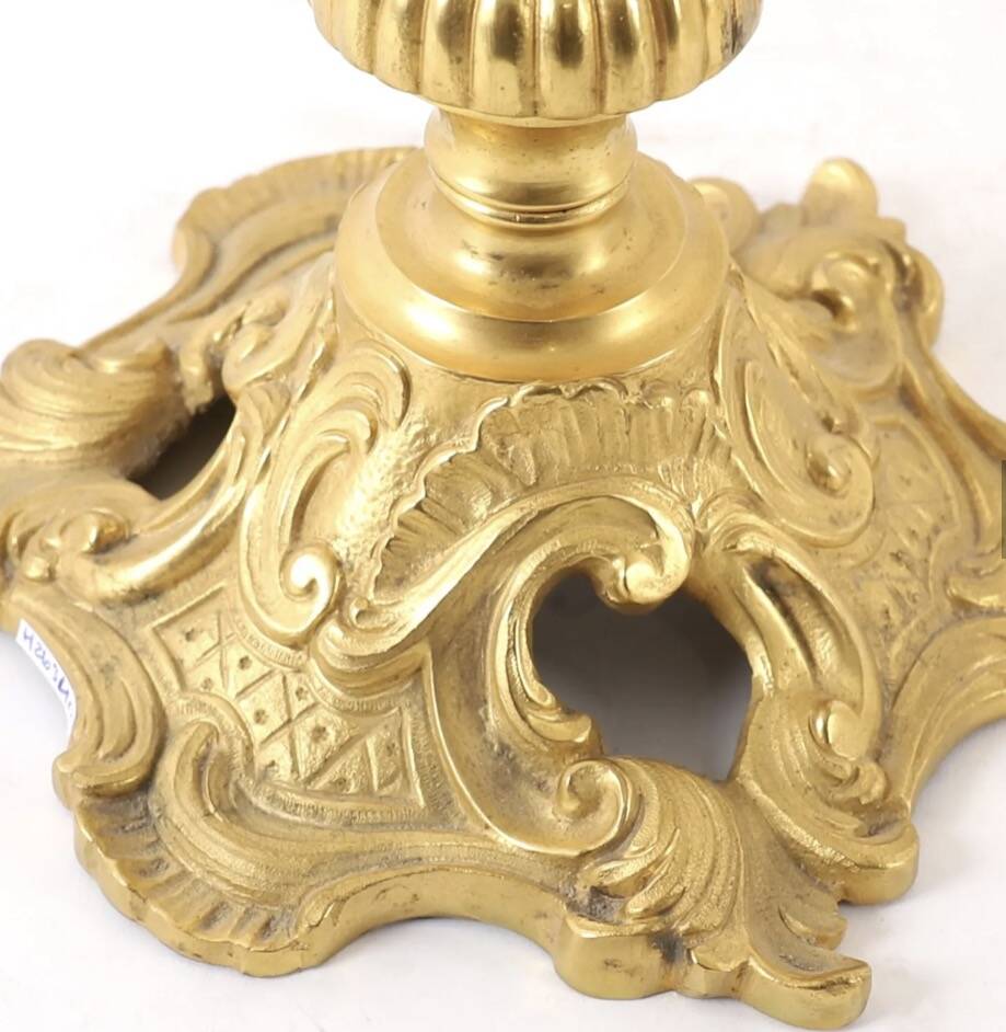 Pair of candelabra, in Louis XV style, in gilded bronze.