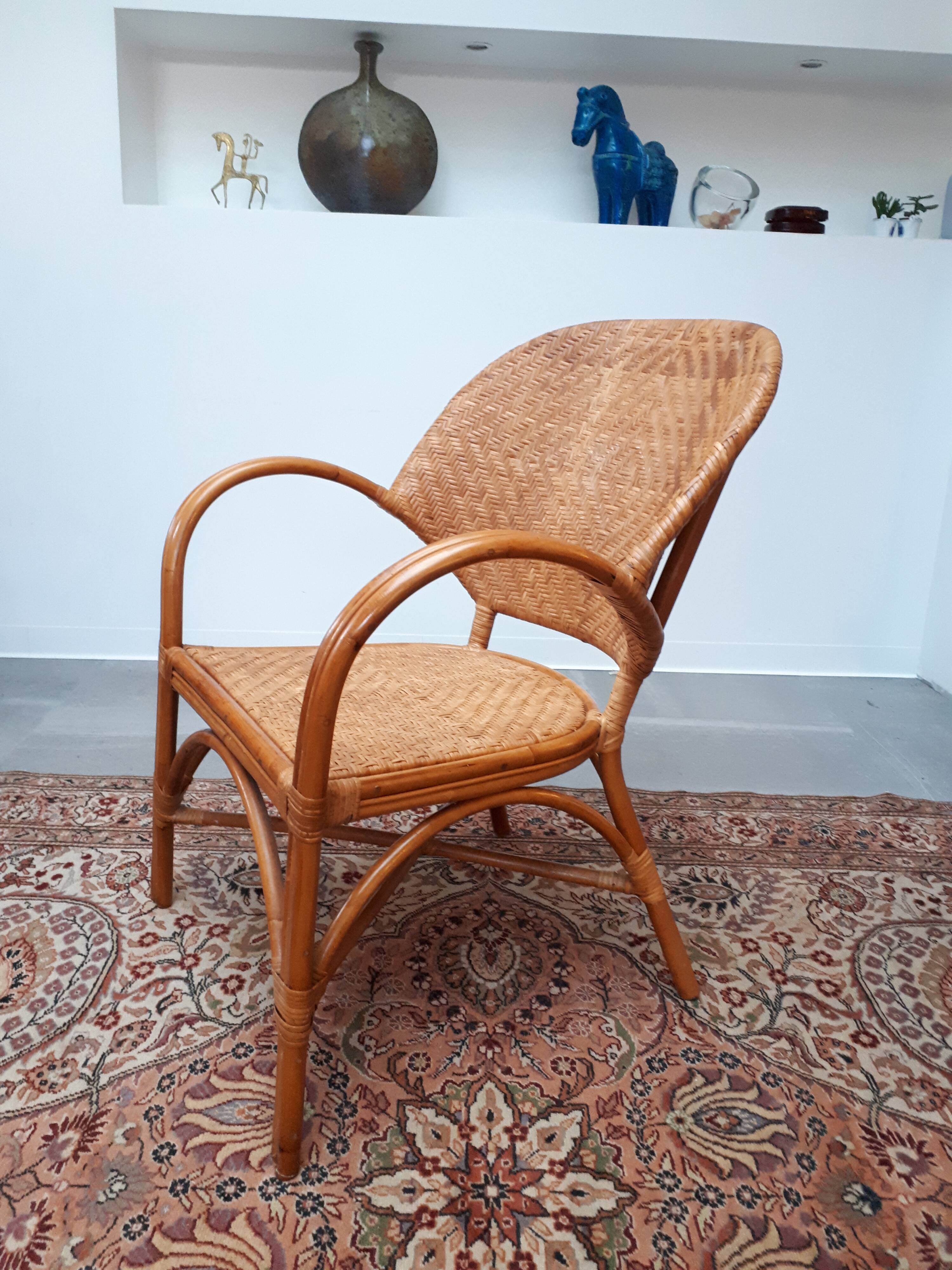 Pair of armchairs in braided rattan 70s