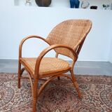 Pair of armchairs in braided rattan 70s