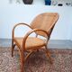 Pair of armchairs in braided rattan 70s