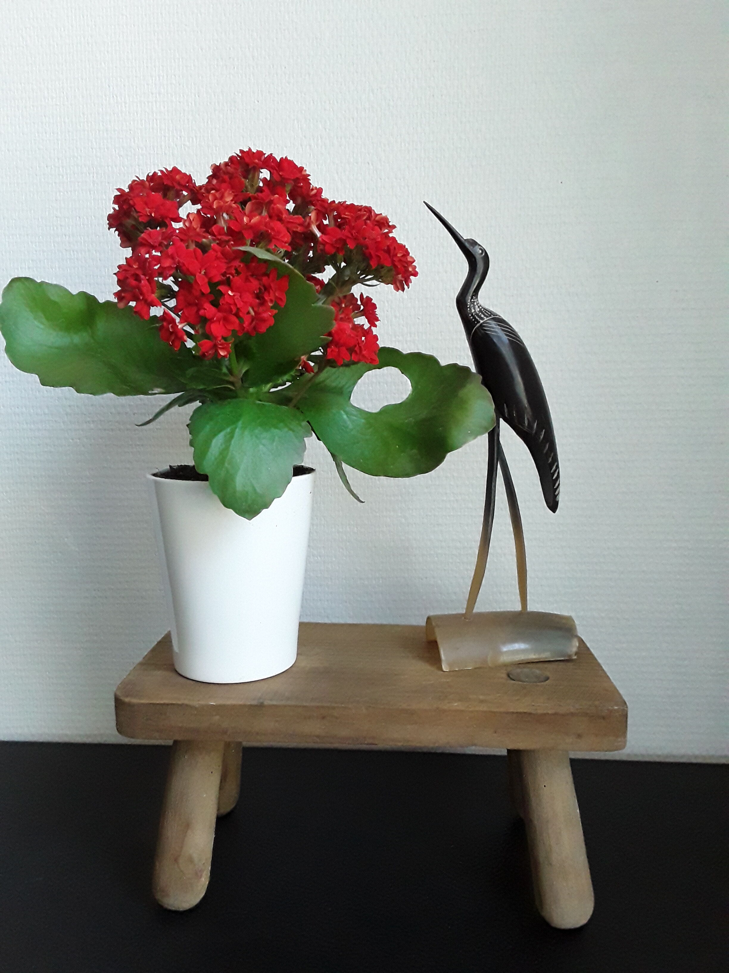 Vintage footstool in light wood