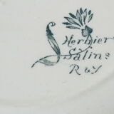 Six assiettes en terre de fer de Salins