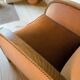 Art Deco club armchair in wood and rust brown velvet, circa 1930.