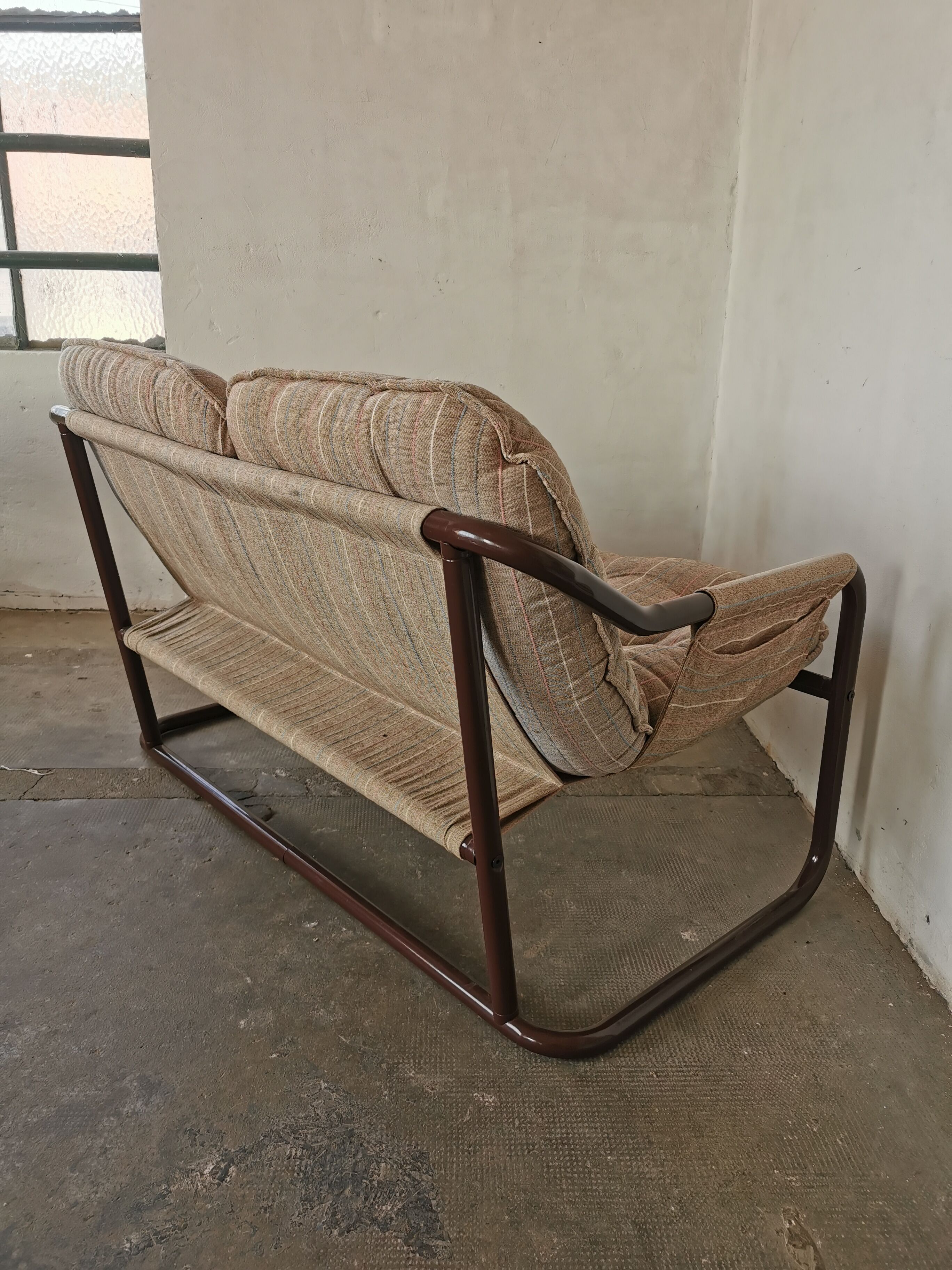 Tubular metal bench from the 80s