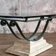Table basse en verre et métal patine antique