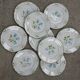 9 vintage floral dessert plates hand-painted Badonvillers