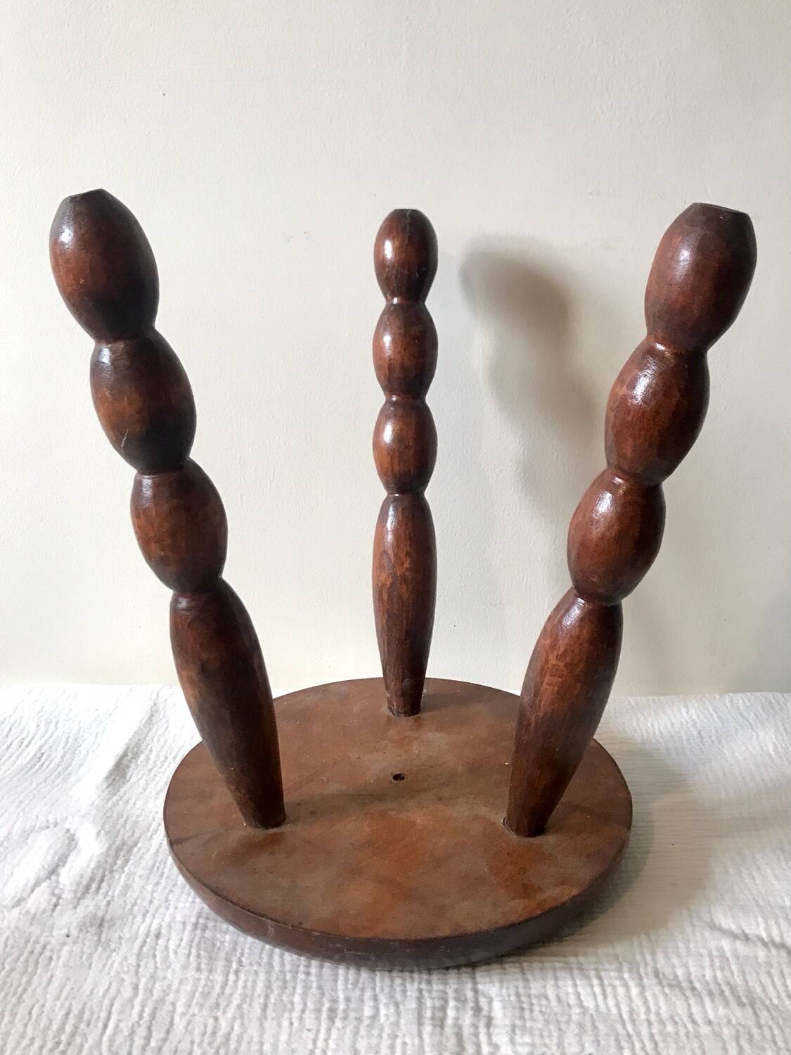 Tripod stool with coil legs