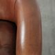 Cow leather club armchair in beautiful dark cognac colour in English style