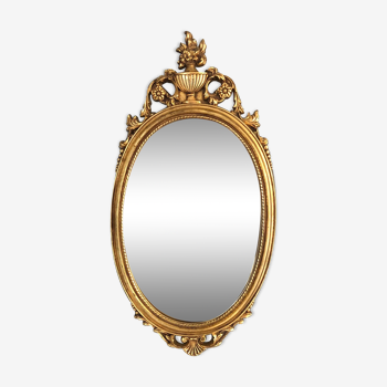 Oval gilded mirror baroque style