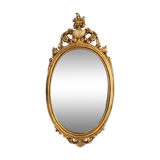 Oval gilded mirror baroque style