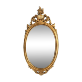 Miroir doré ovale style baroque