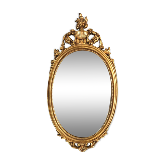Oval gilded mirror baroque style
