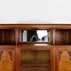 Art Deco showcase bookcase in carved walnut, France, circa 1925