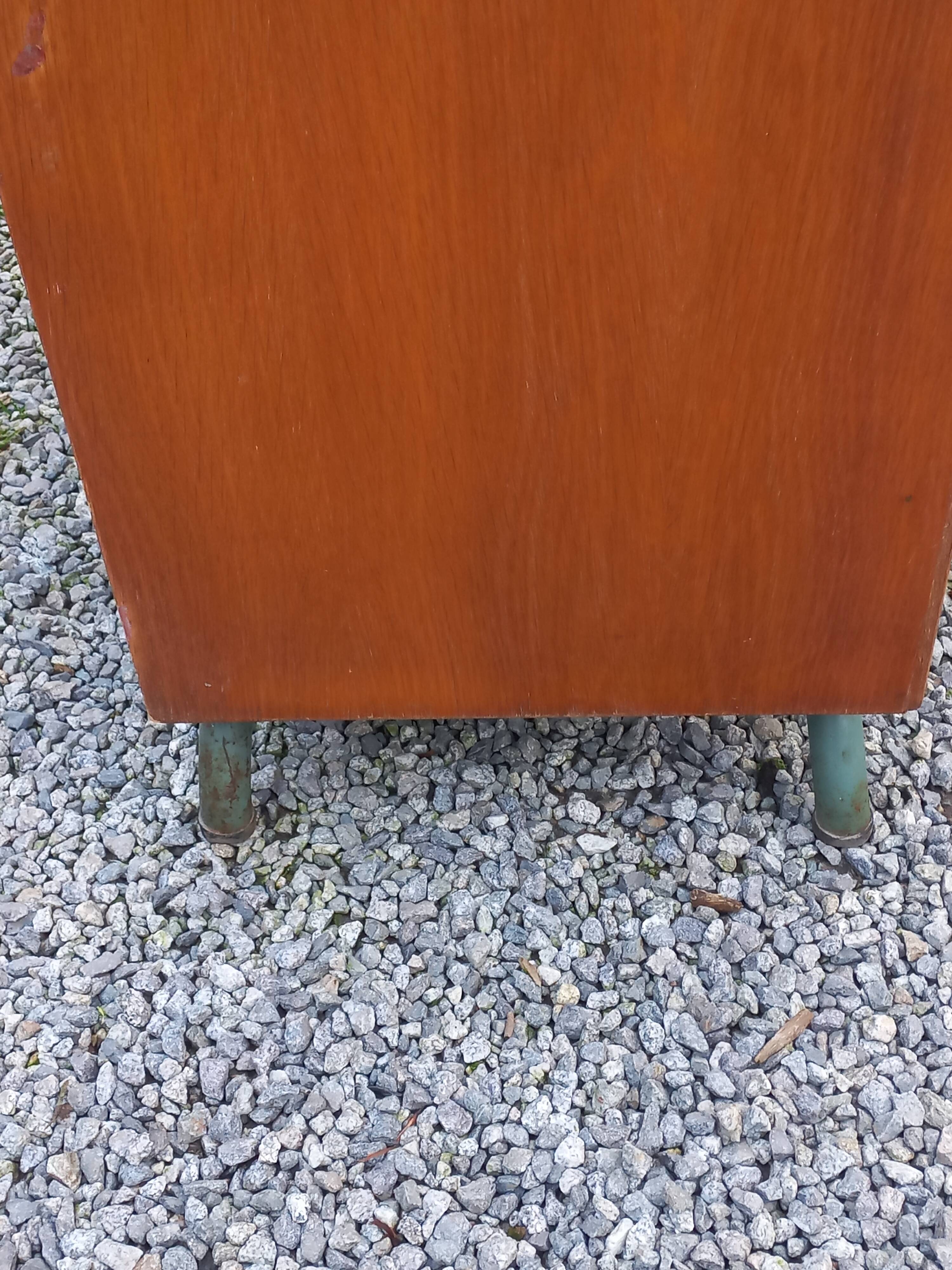 Vintage oak wardrobe with metal legs from the 1950s.