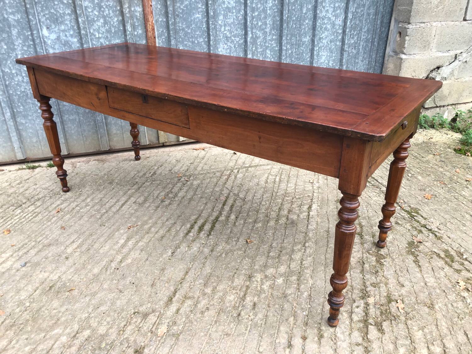 Antique farmhouse table in solid cherry wood with 4 drawers