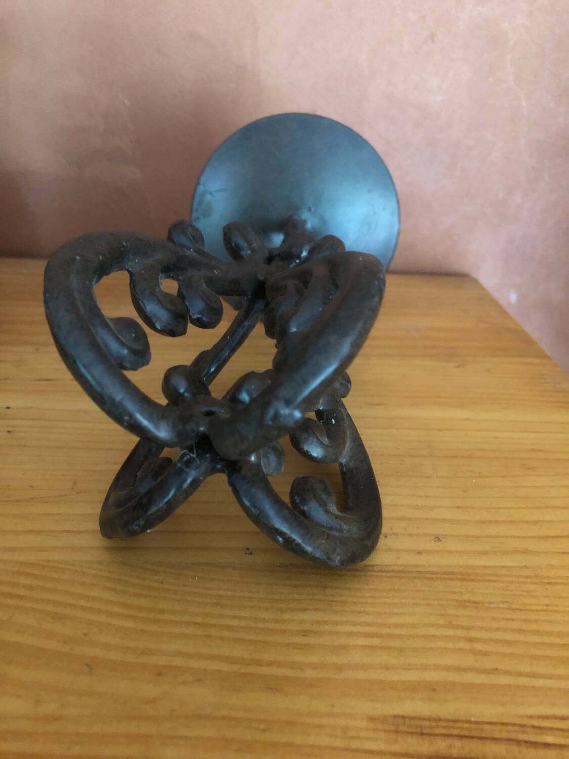 Cast iron candle holder