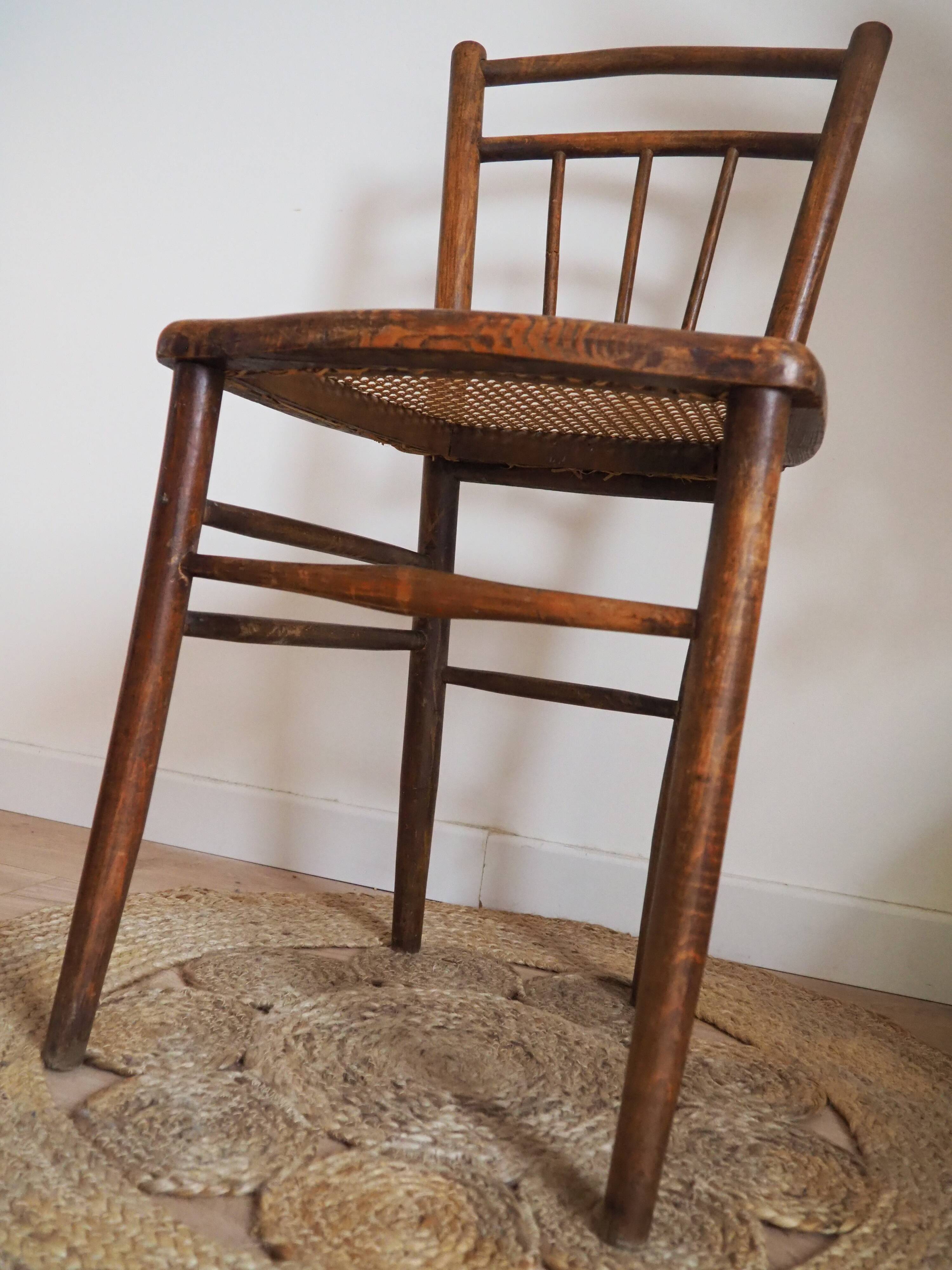 Wooden chair with cane seat